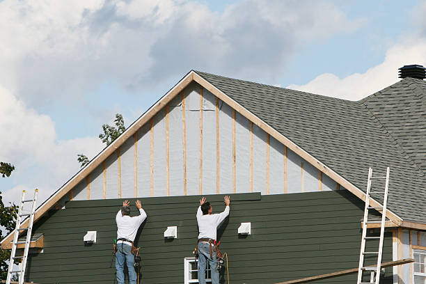 Professional Siding Contractor technician working in Fombell, PA